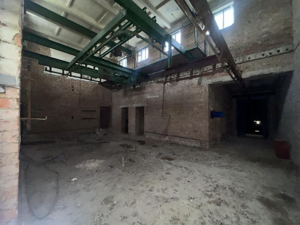 Здание многофункциональное юго-западнее д. Хойники , площадью 1006.4 кв.м.